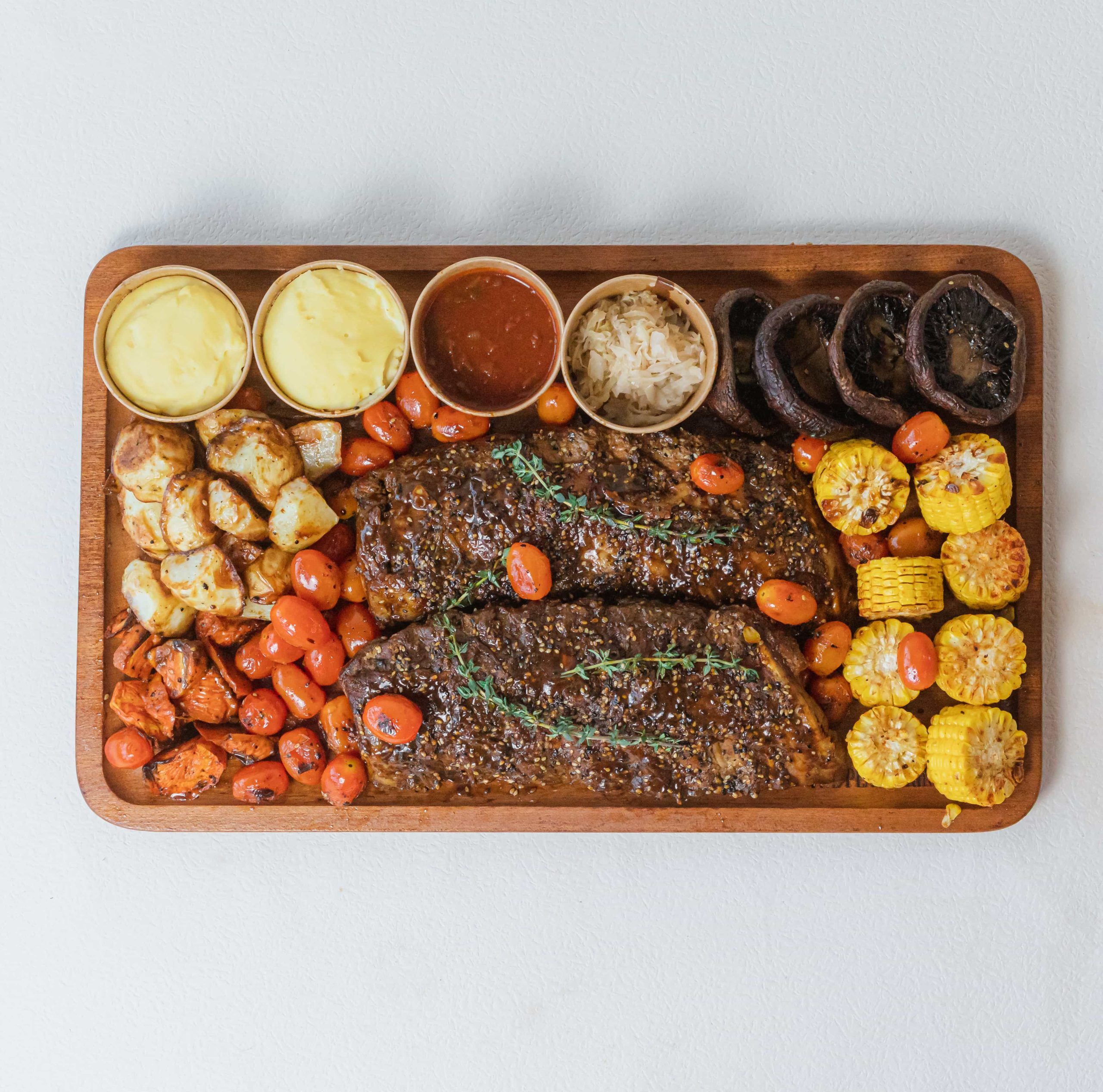 Guinness baby back ribs meat platter with sides, perfect for 5 to 7 guests in Singapore